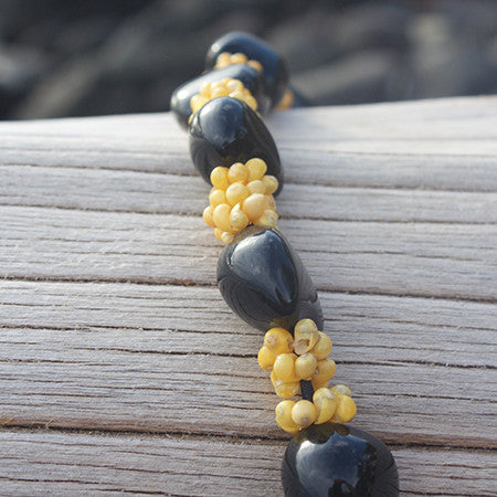 Kukui Nut Lei / Yellow Shells alternating